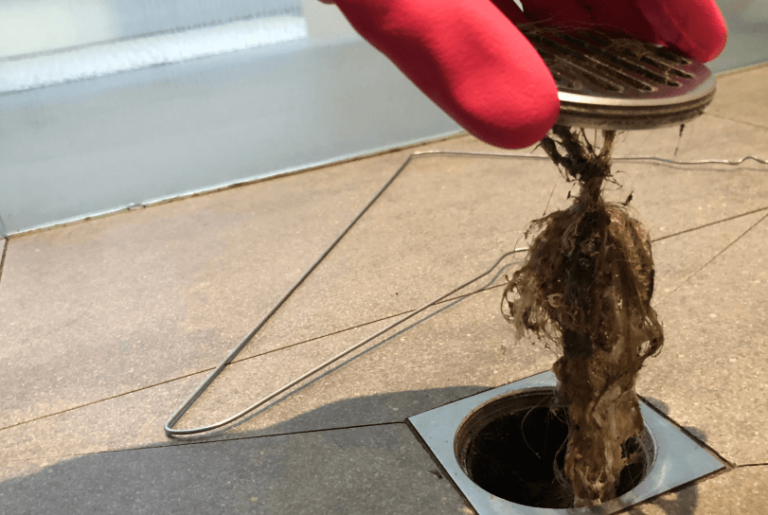 A clogged drain with hair